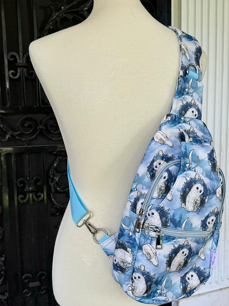 Nature-inspired Barn Owl Sling Bag with intricate barn owl artwork. A unique and practical accessory for art lovers and nature enthusiasts.