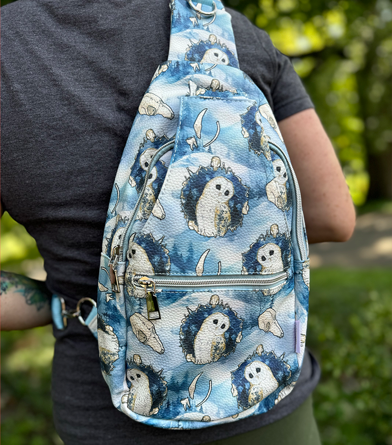 Stylish and functional Barn Owl Sling Bag featuring a stunning print of the Barn Owl painting. Perfect over the shoulder bag for everyday use.
