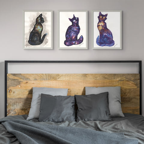 "Galaxy Cat" series by J. Brooke Wade, featuring multiple watercolor paintings of cat silhouettes against vibrant galaxy-themed backgrounds, ideal for collectors of unique cat art and celestial wall decor.