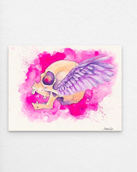 Watercolor painting 'Freedom' by J. Brooke Wade, featuring a female skull with feather-like wings against a vibrant magenta backdrop, symbolizing transformation and rebirth